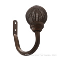 Curtain hold back with finial